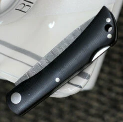 Boker Solingen Rangebuster 110914DAM, 3.03" Stainless Steel Damascus Blade, Black Linen Micarta Handles -Knifeworks Sales Shop BO110914DAM.2 69193.1646840109